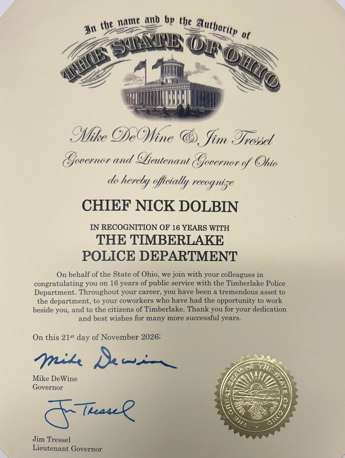Nick Dolbin certificate from the State of Ohio recognizing 16 years of service with the Timberlake Police Department.